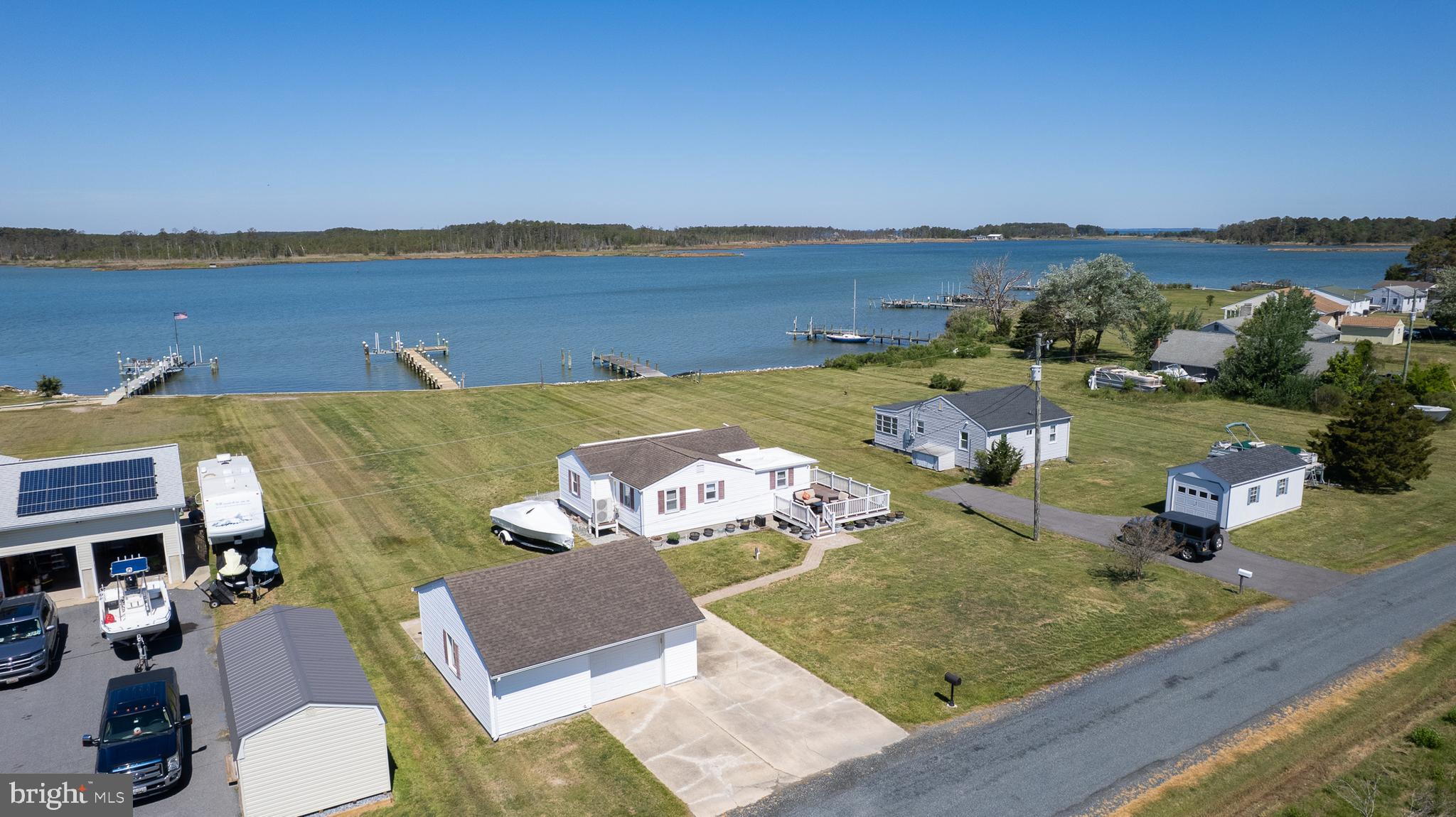 5558 Bowen Road Cambridge, MD 21613 - Photo 1 of 33 a view of a lake with couches and city view