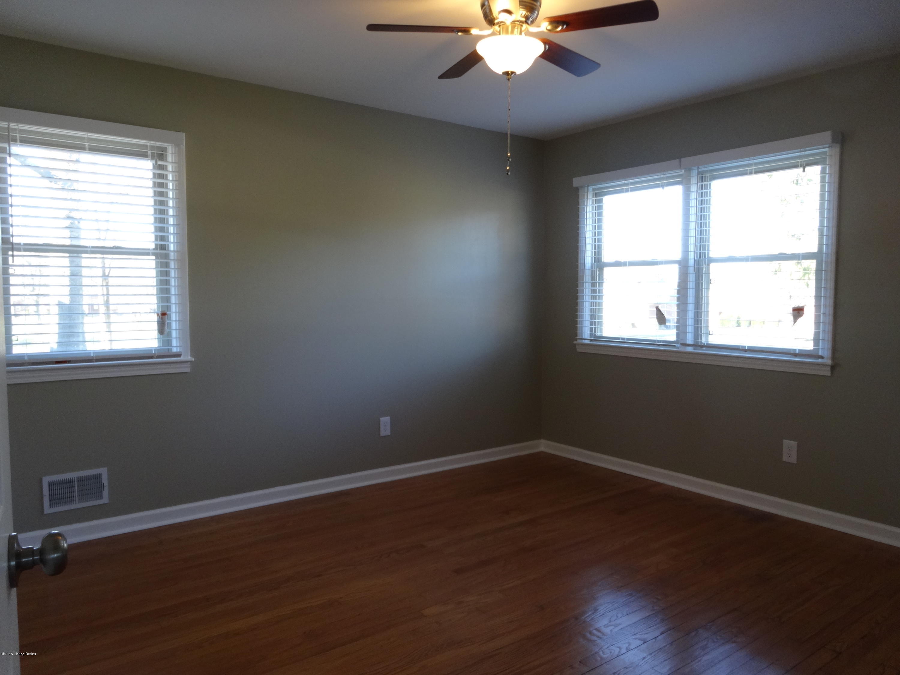 4402 Lowe Road Louisville, KY 40220 - Photo 15 of 44 Bdrm 3 Newly finished Hardwood Floors plantation shades, ceiling fans
