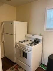 1828 Rosedale Street Houston, TX 77004 - Photo 25 of 32 a stove top oven sitting inside of a kitchen