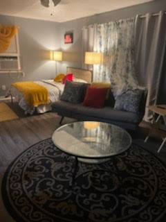 1828 Rosedale Street Houston, TX 77004 - Photo 31 of 32 a living room with furniture and a lamp
