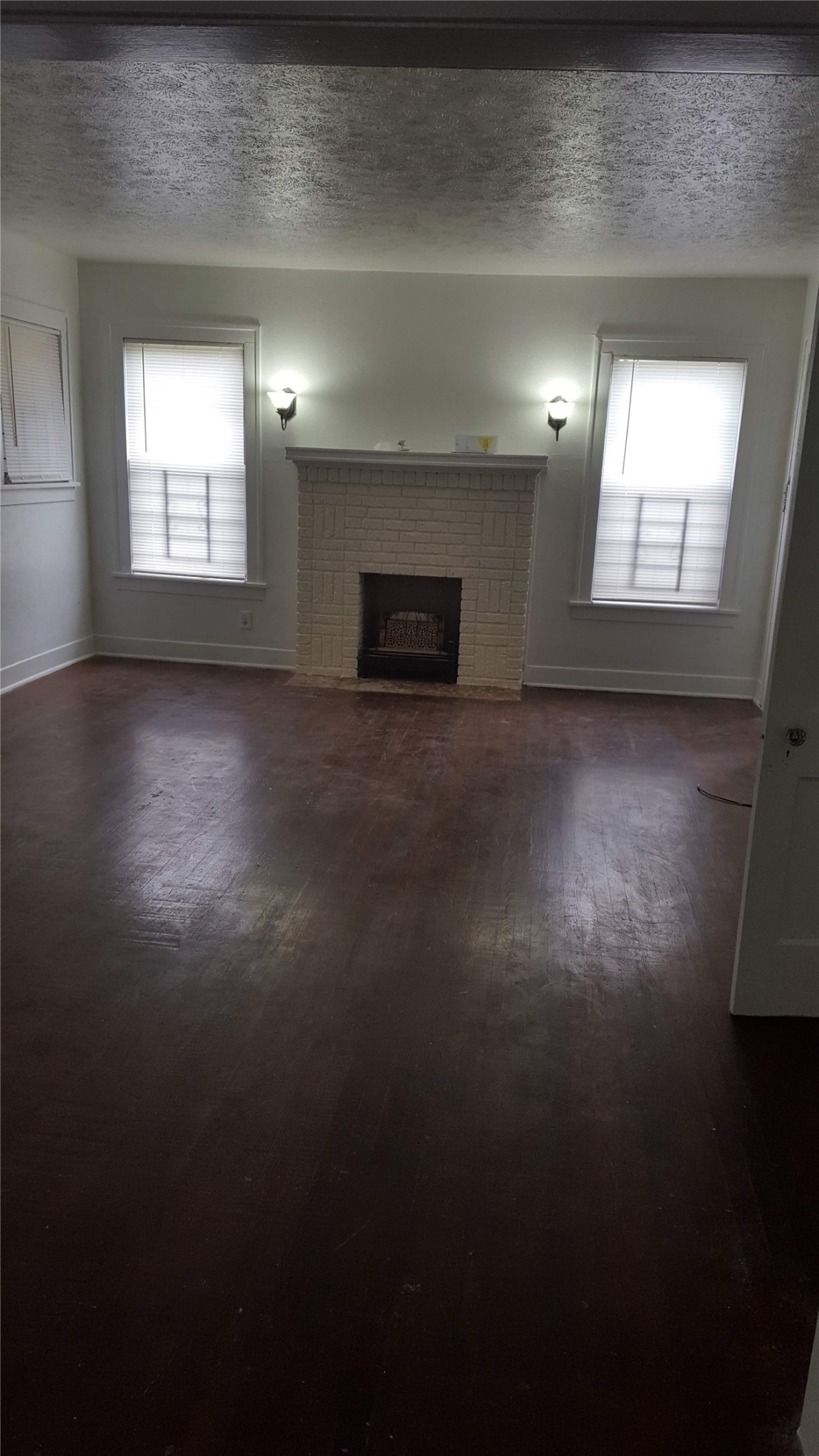 1828 Rosedale Street Houston, TX 77004 - Photo 8 of 32 a view of an empty room with a window