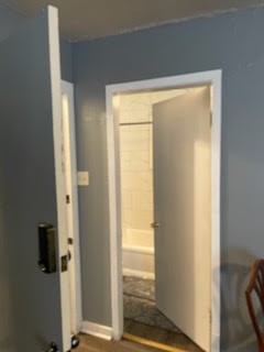 1828 Rosedale Street Houston, TX 77004 - Photo 10 of 32 a view of a bathroom with a glass door