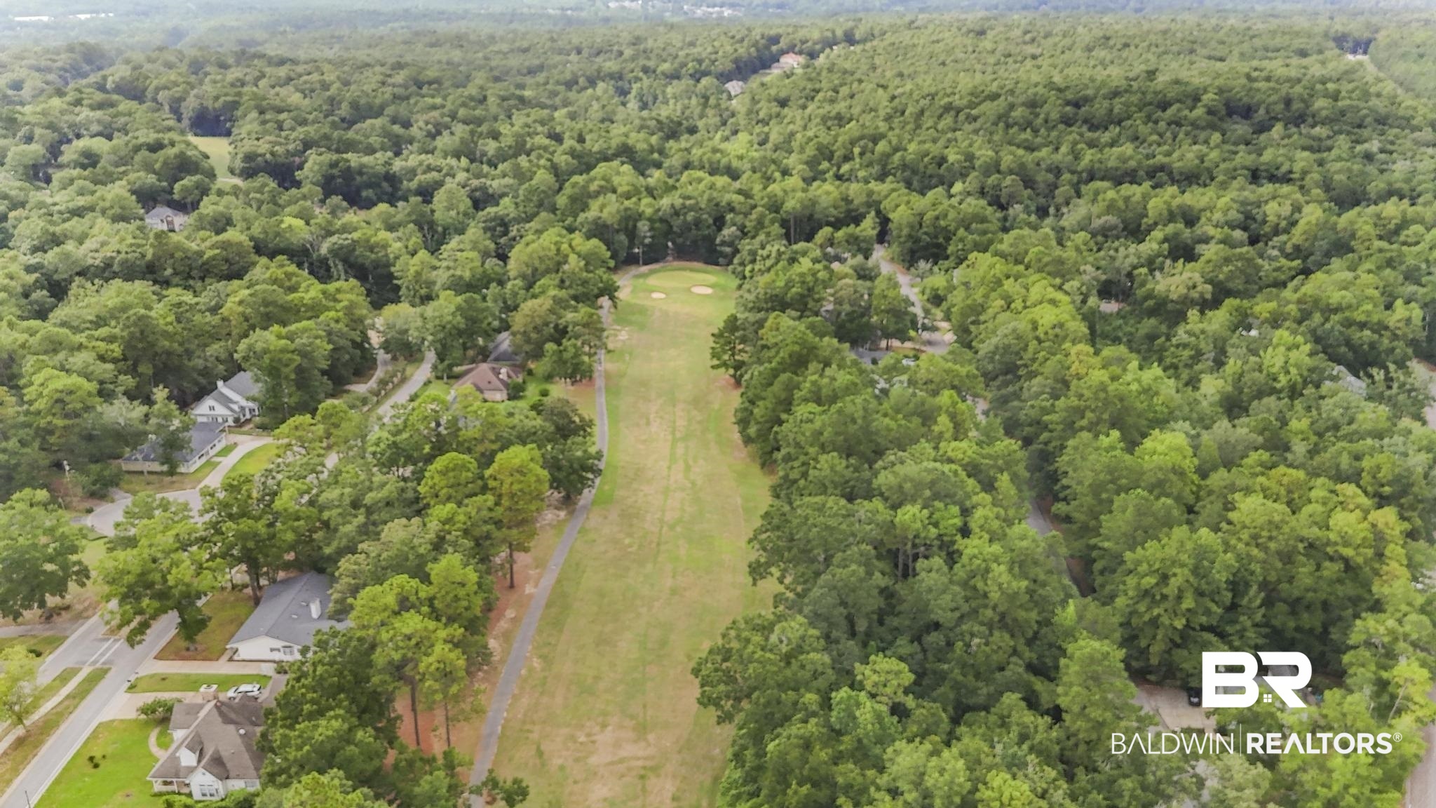 140 Hope Drive Daphne, AL 36526 - Photo 51 of 54 View of property location with a heavily wooded area