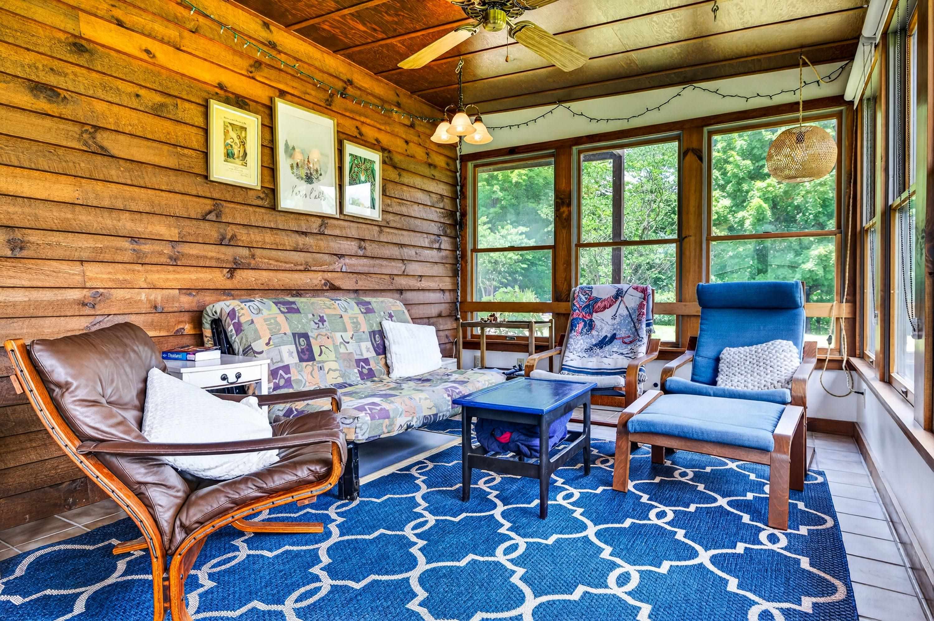 3980 Greenmount Road Harrisonburg, VA 22802 - Photo 15 of 75 This sunroom space offers an abundance of sunshine and overlooks the backyard of the home.