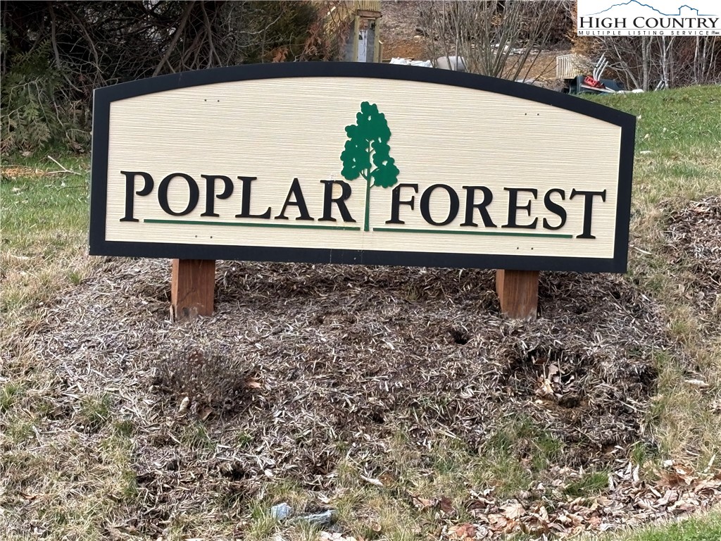 Lot 65 Poplar Forest Drive Boone, NC 28607 - Photo 37 of 37 a sign broad in front of a white building
