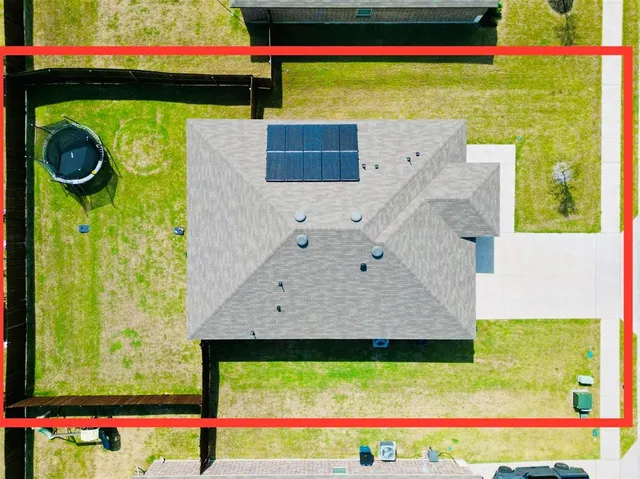 a view of swimming pool with a garden and seating area