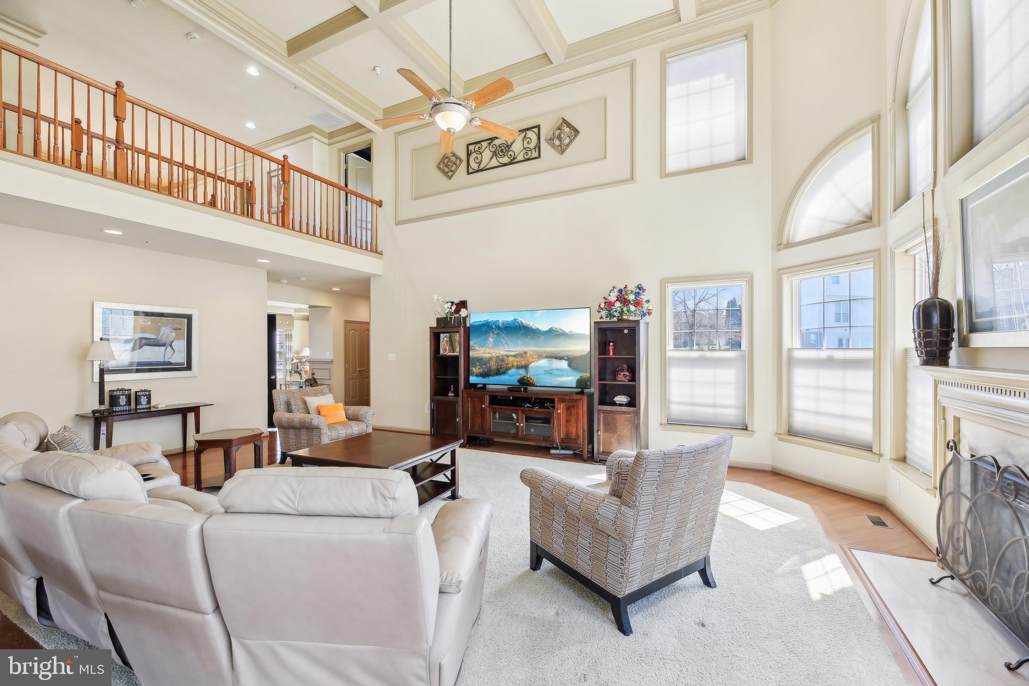7020 Ironbridge Lane Laurel, MD 20707 - Photo 13 of 63 a living room with furniture and a ceiling fan