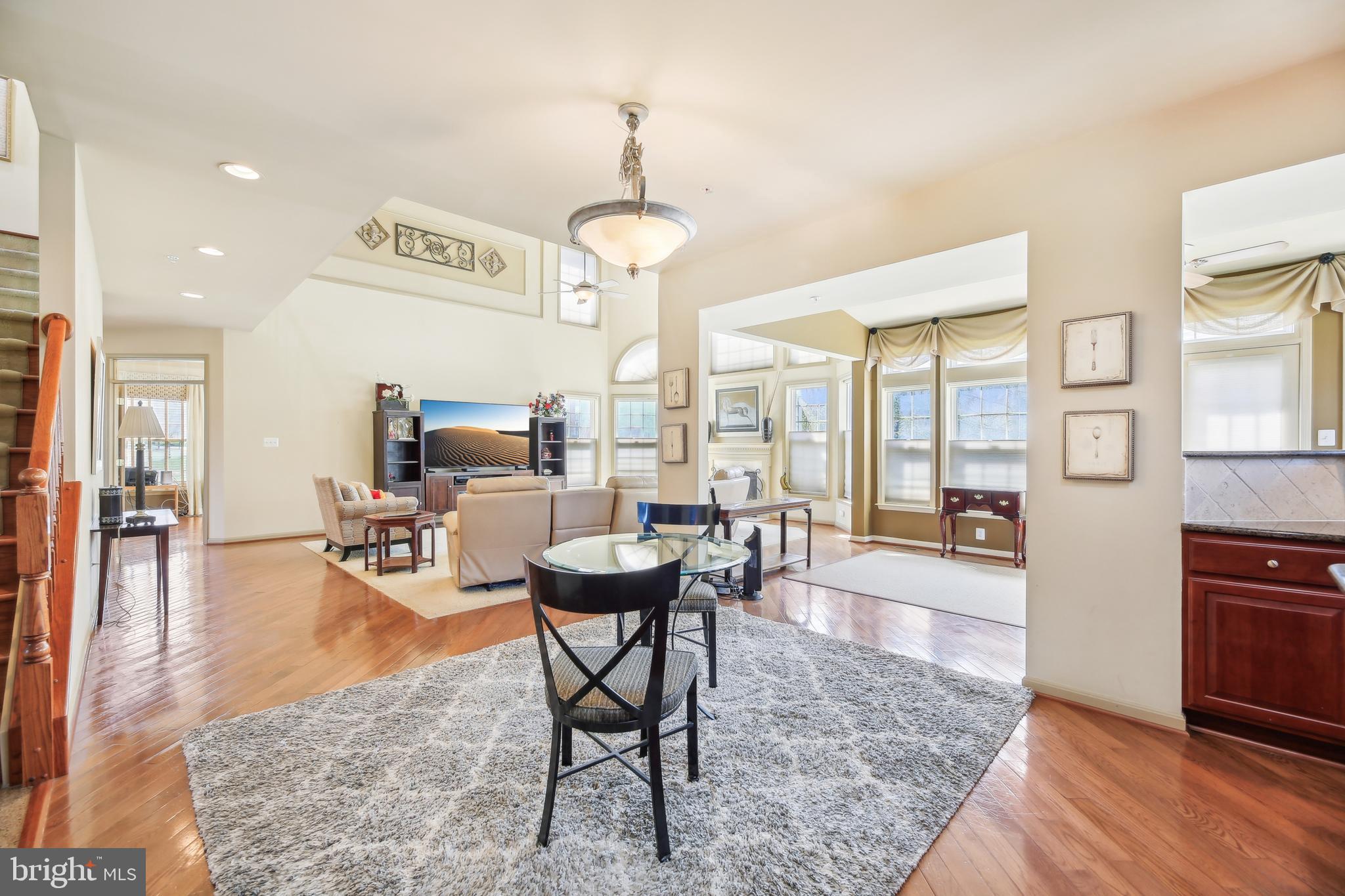 7020 Ironbridge Lane Laurel, MD 20707 - Photo 20 of 63 a view of a livingroom and dining room