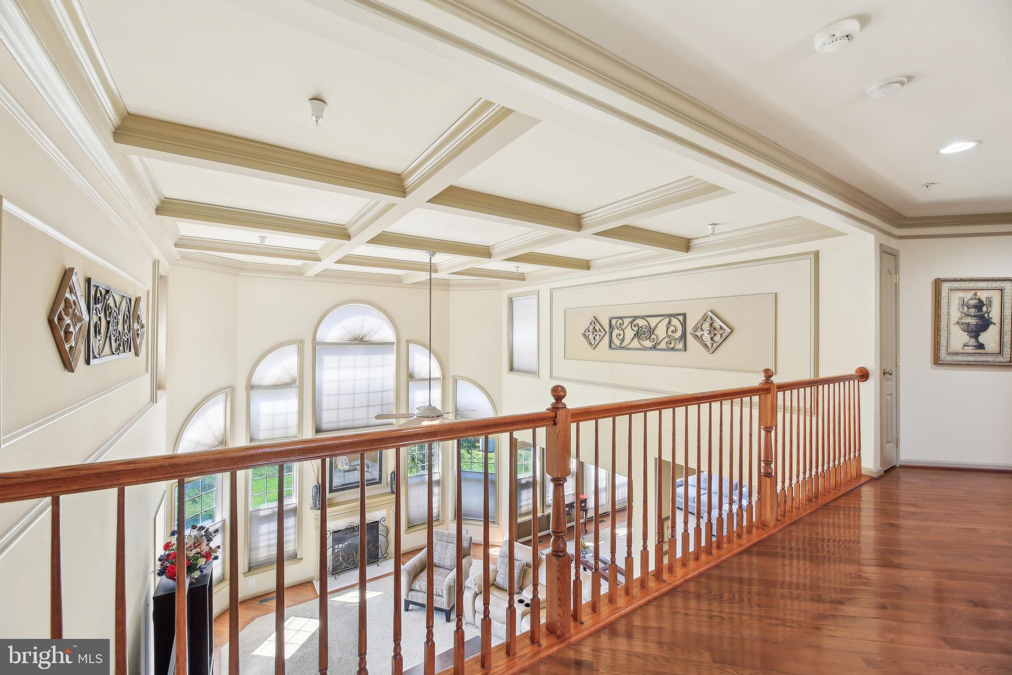 7020 Ironbridge Lane Laurel, MD 20707 - Photo 29 of 63 a view of a hallway with wooden floor