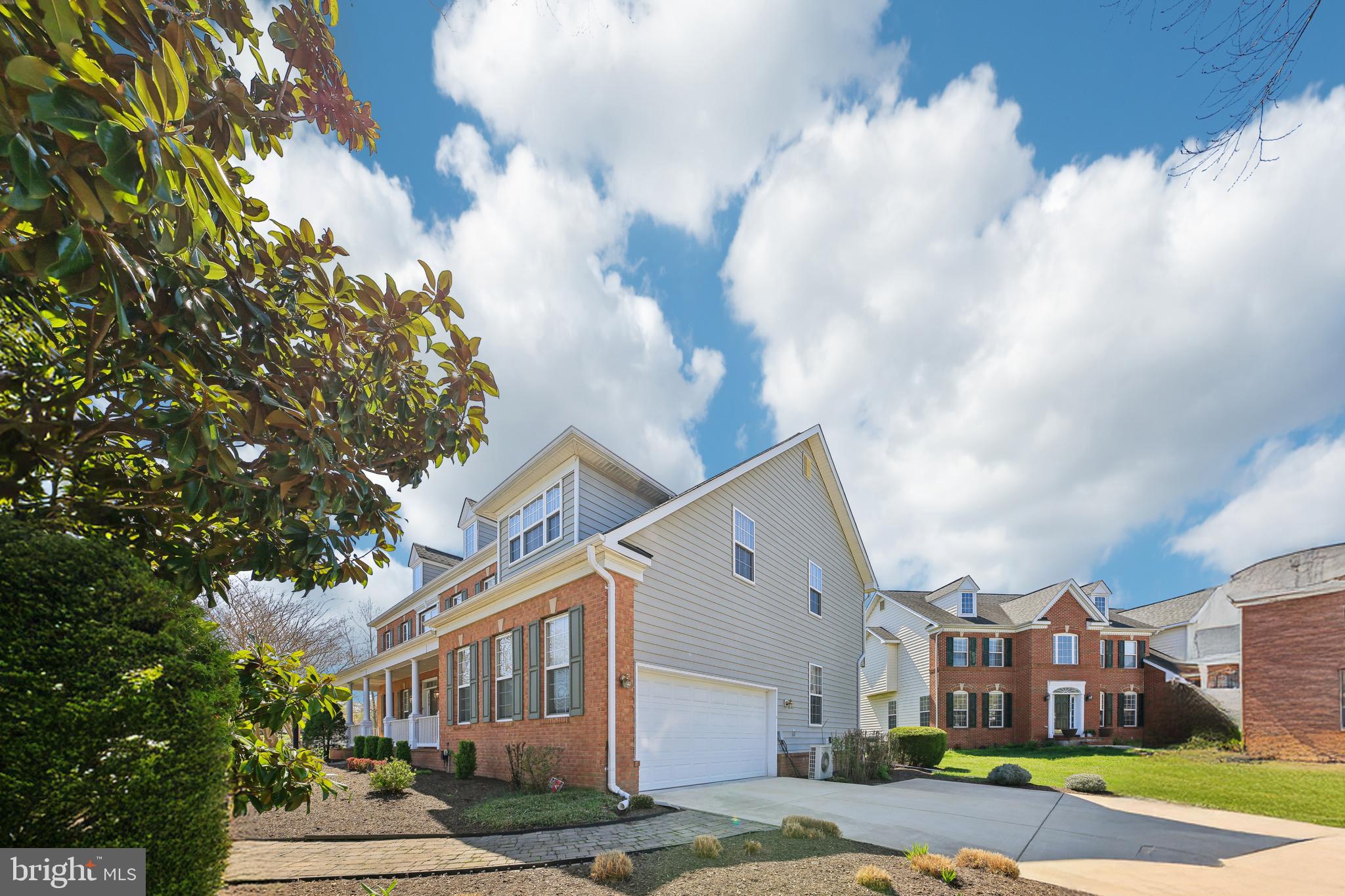 7020 Ironbridge Lane Laurel, MD 20707 - Photo 4 of 63 a view of a white building among the street