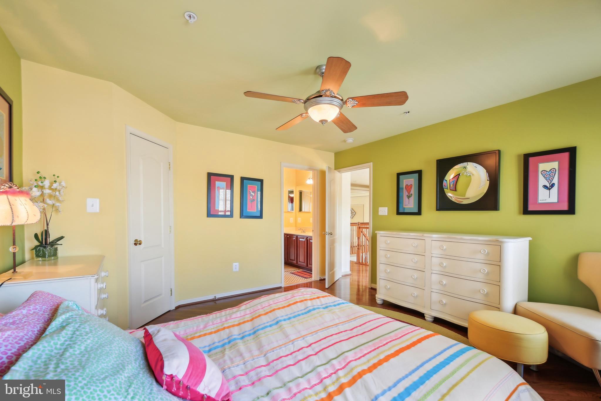 7020 Ironbridge Lane Laurel, MD 20707 - Photo 41 of 63 a bedroom with a bed and a dresser