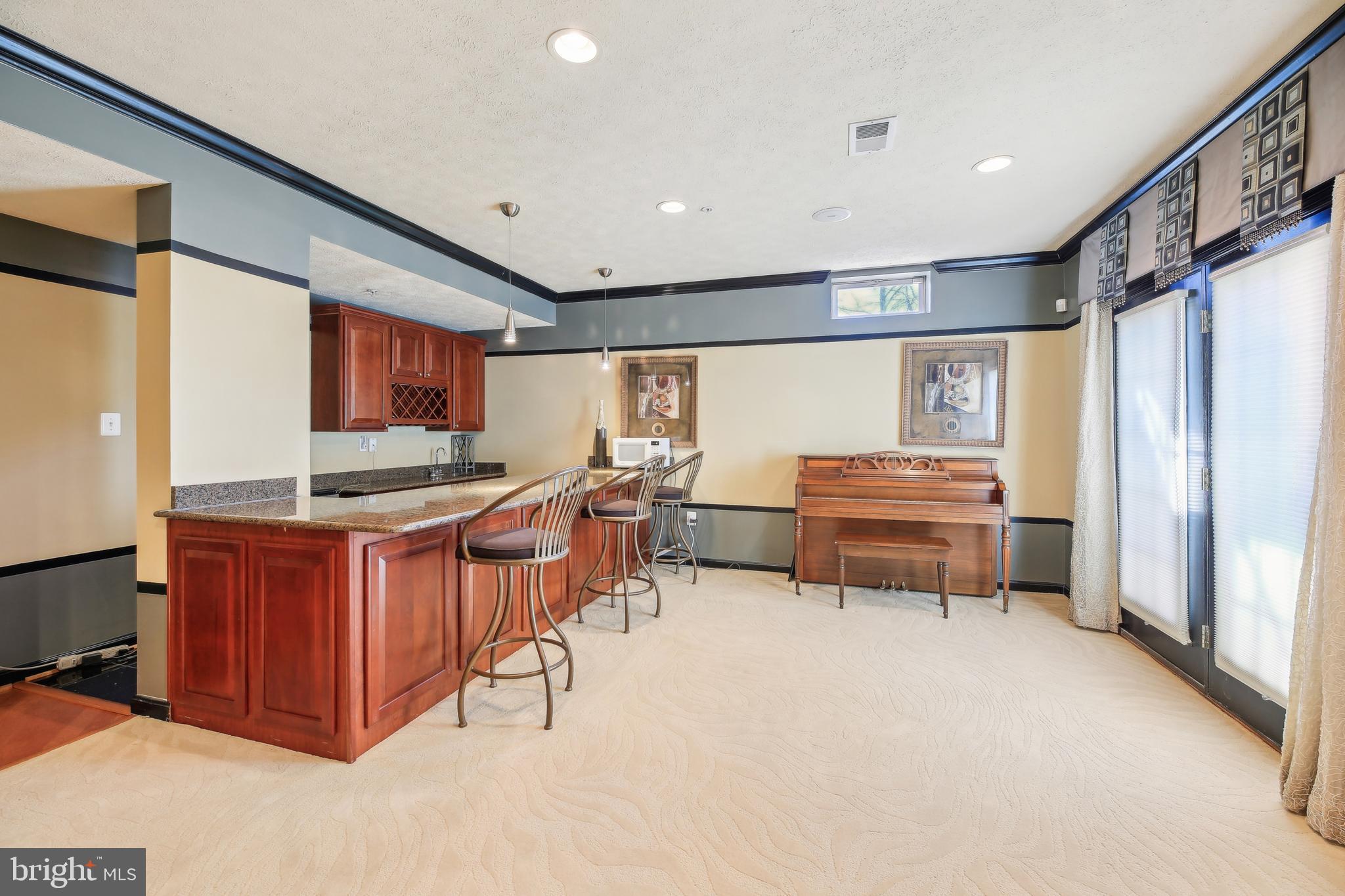 7020 Ironbridge Lane Laurel, MD 20707 - Photo 48 of 63 a room with furniture a air conditioner and window