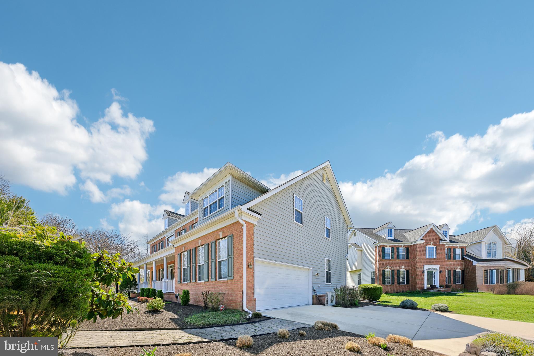 7020 Ironbridge Lane Laurel, MD 20707 - Photo 5 of 63 a view of a white building among the street