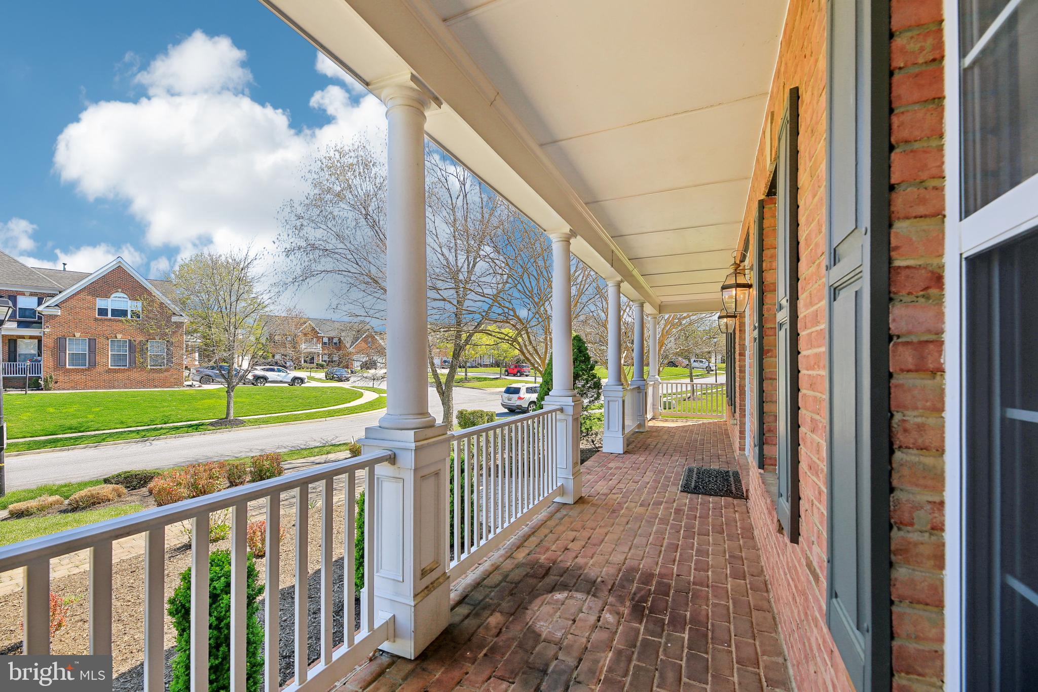 7020 Ironbridge Lane Laurel, MD 20707 - Photo 7 of 63 a view of a porch with a yard