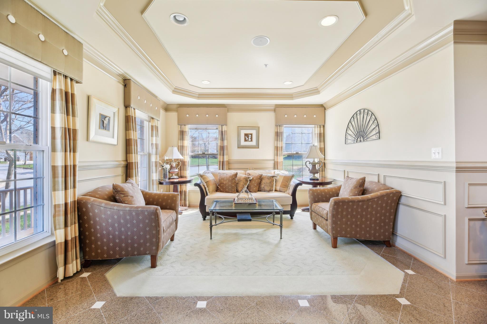 7020 Ironbridge Lane Laurel, MD 20707 - Photo 10 of 63 a living room with furniture and a large window