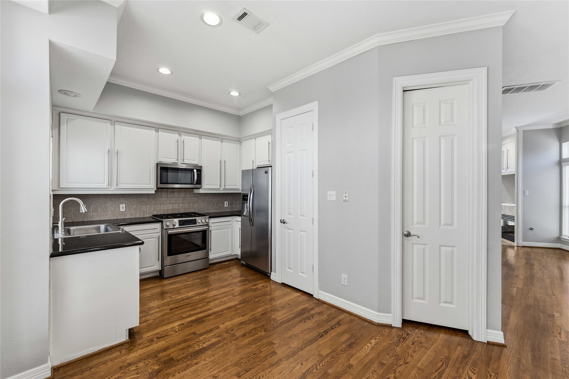 1332 Fairview Street Houston, TX 77006 - Photo 11 of 25 Walk in pantry meanders behind stairs. It's a lot of spaced