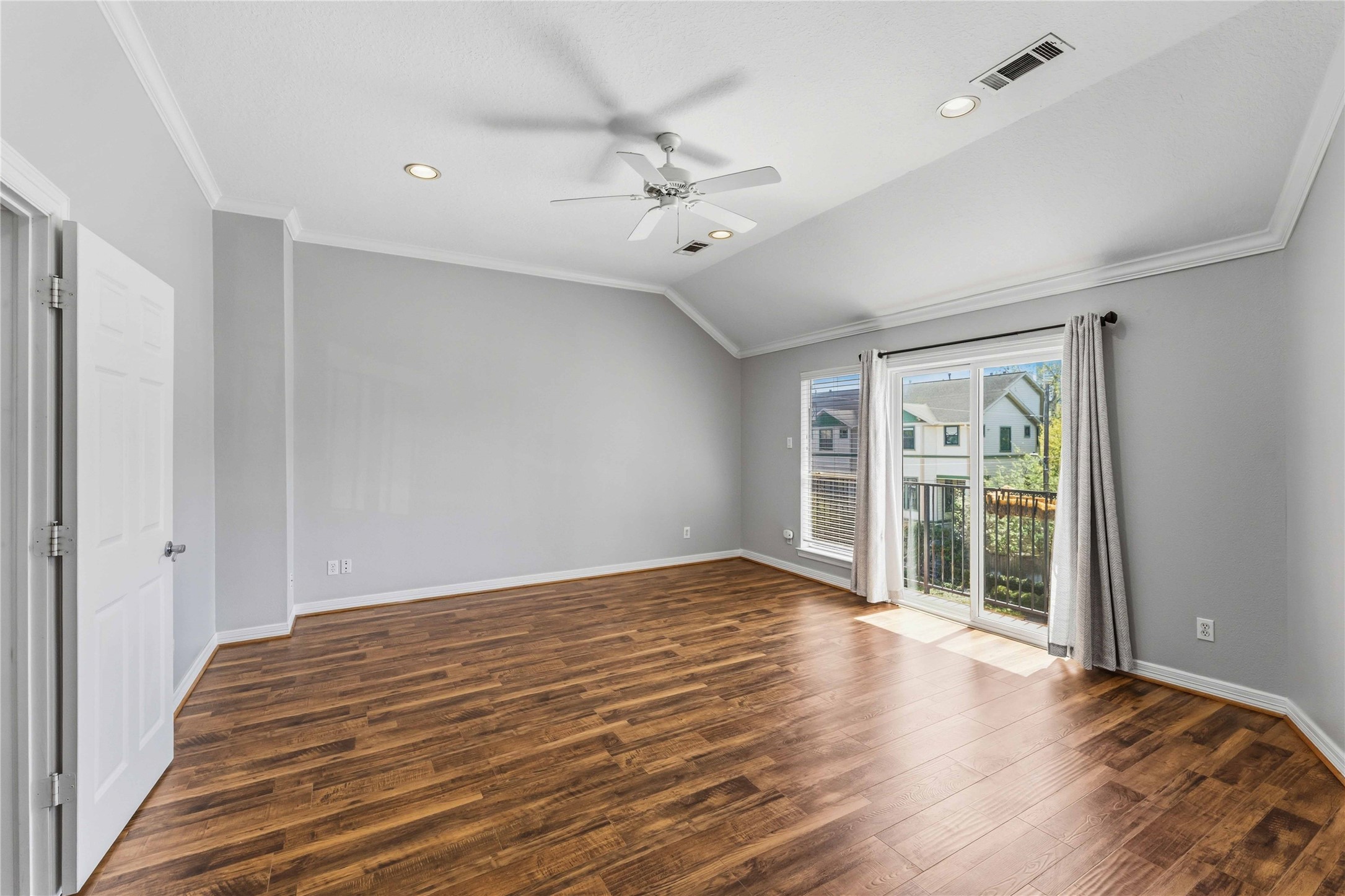 1332 Fairview Street Houston, TX 77006 - Photo 15 of 25 Primary bedroom has tray ceiling and balcony.
