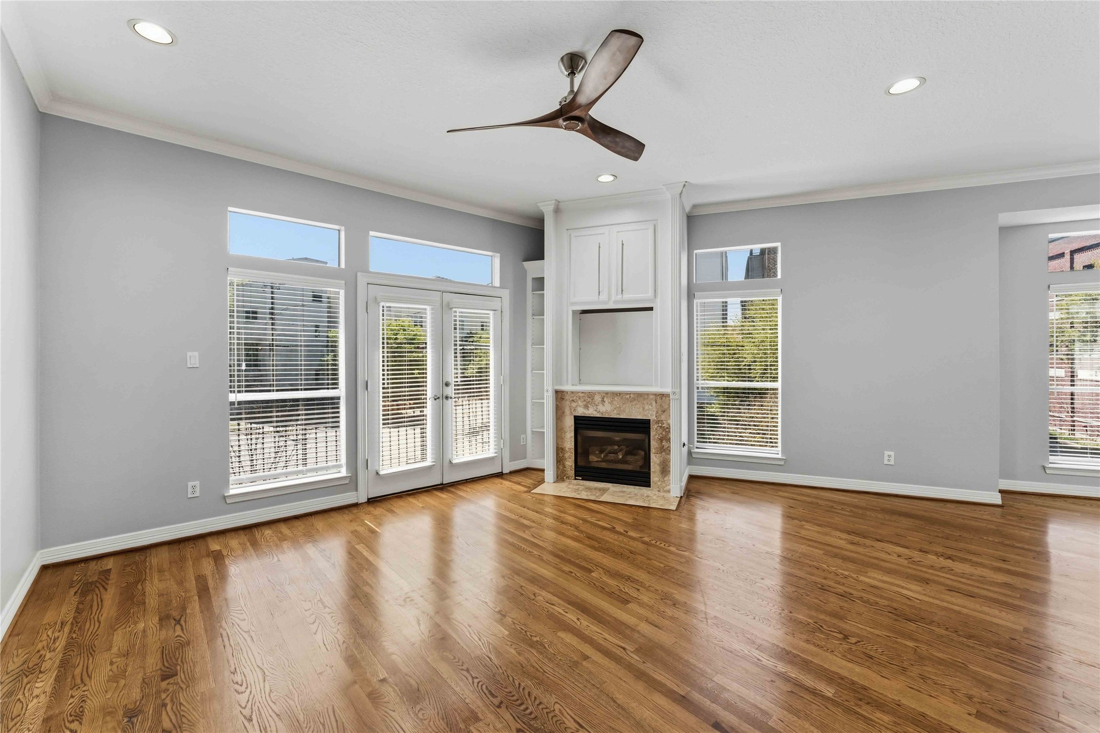1332 Fairview Street Houston, TX 77006 - Photo 9 of 25 Lots of natural light here with balcony access facing south. If you love plants, they'll do well here.