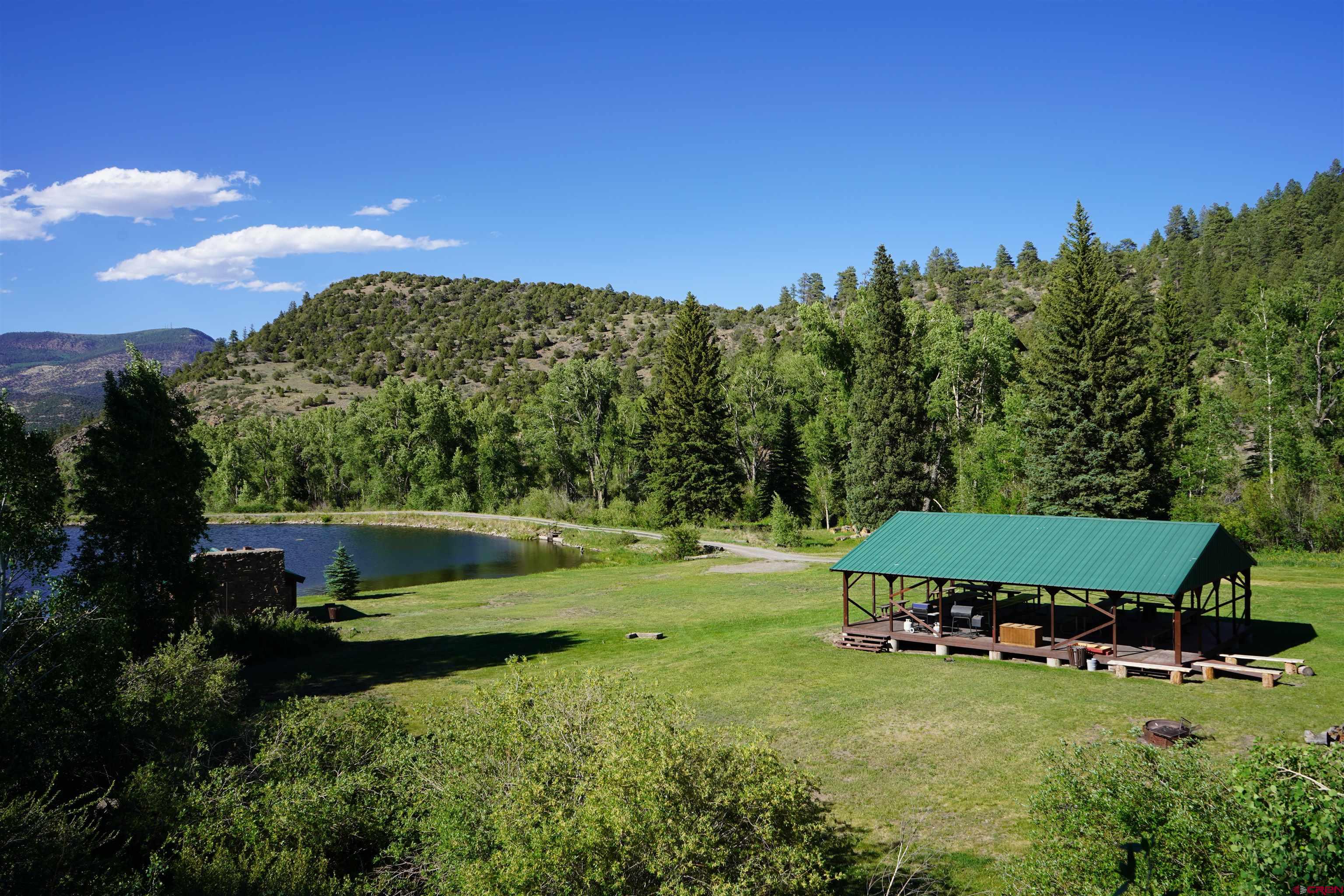 852 Forest Cir Fork South Fork, CO 81154 - Photo 7 of 7 a view of a garden with an outdoor space