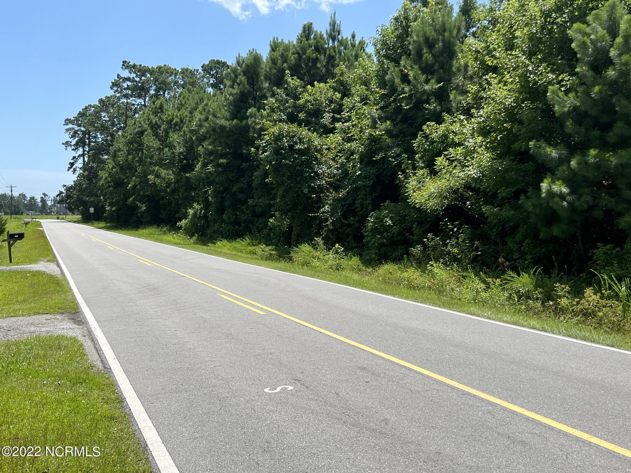 251 Swansboro Loop Road Swansboro, NC 28584 - Photo 2 of 6 Looking South toward Swansboro Property is on West side of road across from 248
