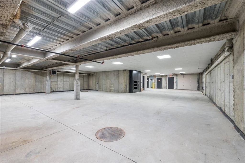 57 University Road, Unit 3 Brookline, MA 02445 - Photo 17 of 20 a view of an empty room