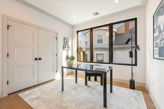 a view of a livingroom with furniture and window