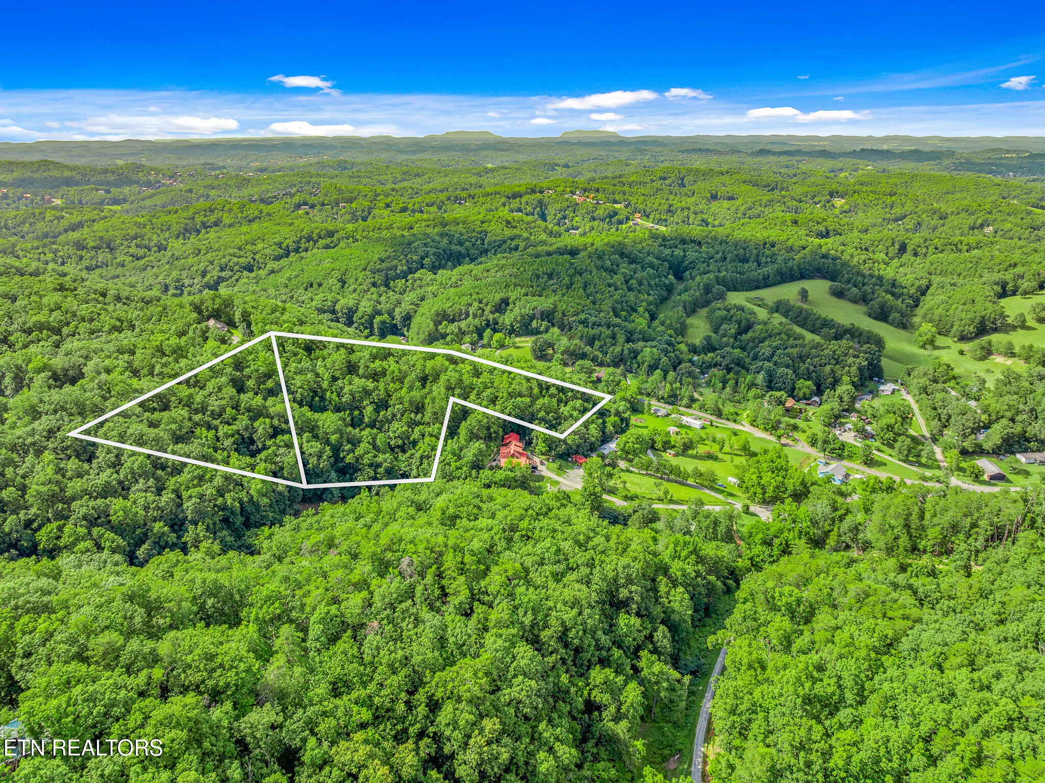 0 Henderson Springs Road Sevierville, TN 37863 - Photo 10 of 14 a view of a field with an outdoor space