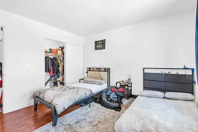 a kitchen with granite countertop cabinets stainless steel appliances and wooden cabinets