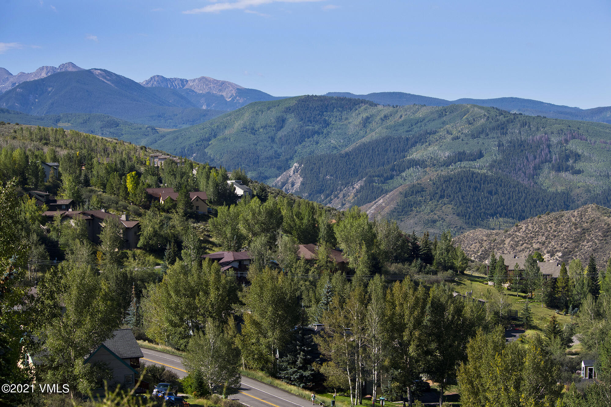 3091 Wildridge Road Avon, CO 81620 - Photo 12 of 13 an aerial view of houses covered in trees