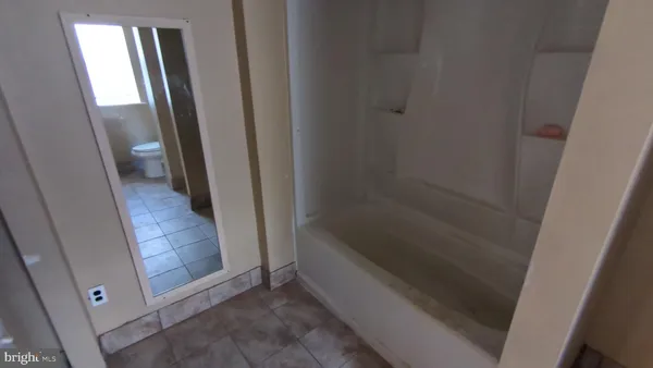 a bathroom with a bathtub