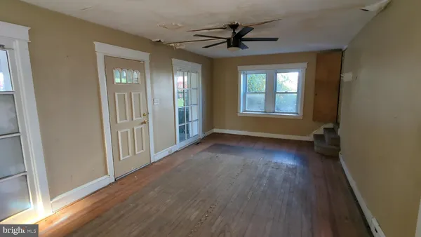 a view of livingroom with hardwood floor and window