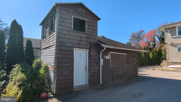 a front view of a house with yard