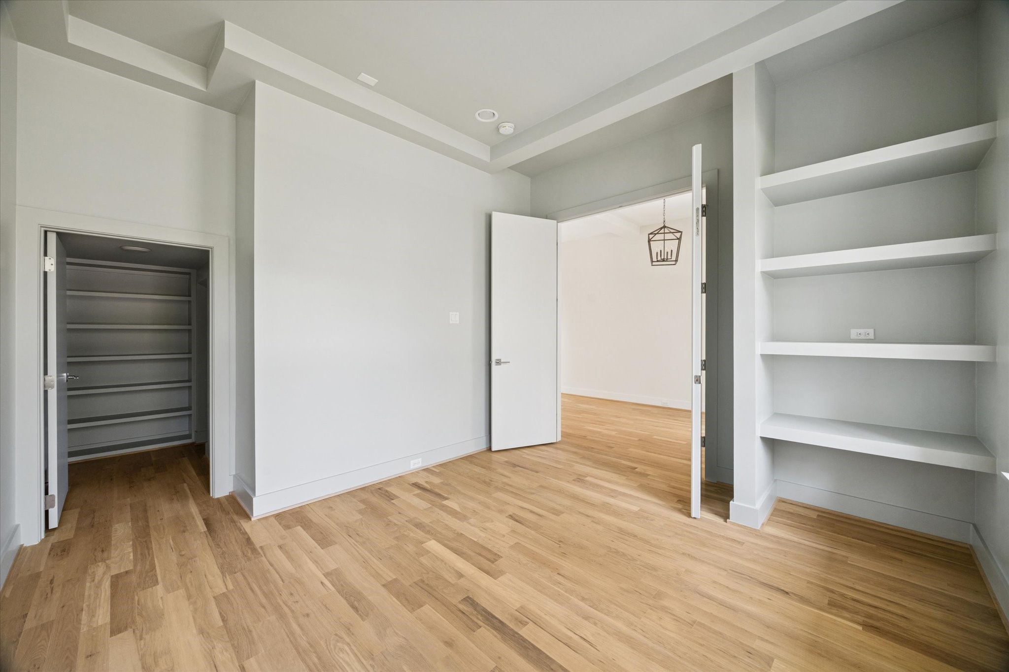 4219 Alba Road Houston, TX 77018 - Photo 16 of 39 a view of empty room with wooden floor