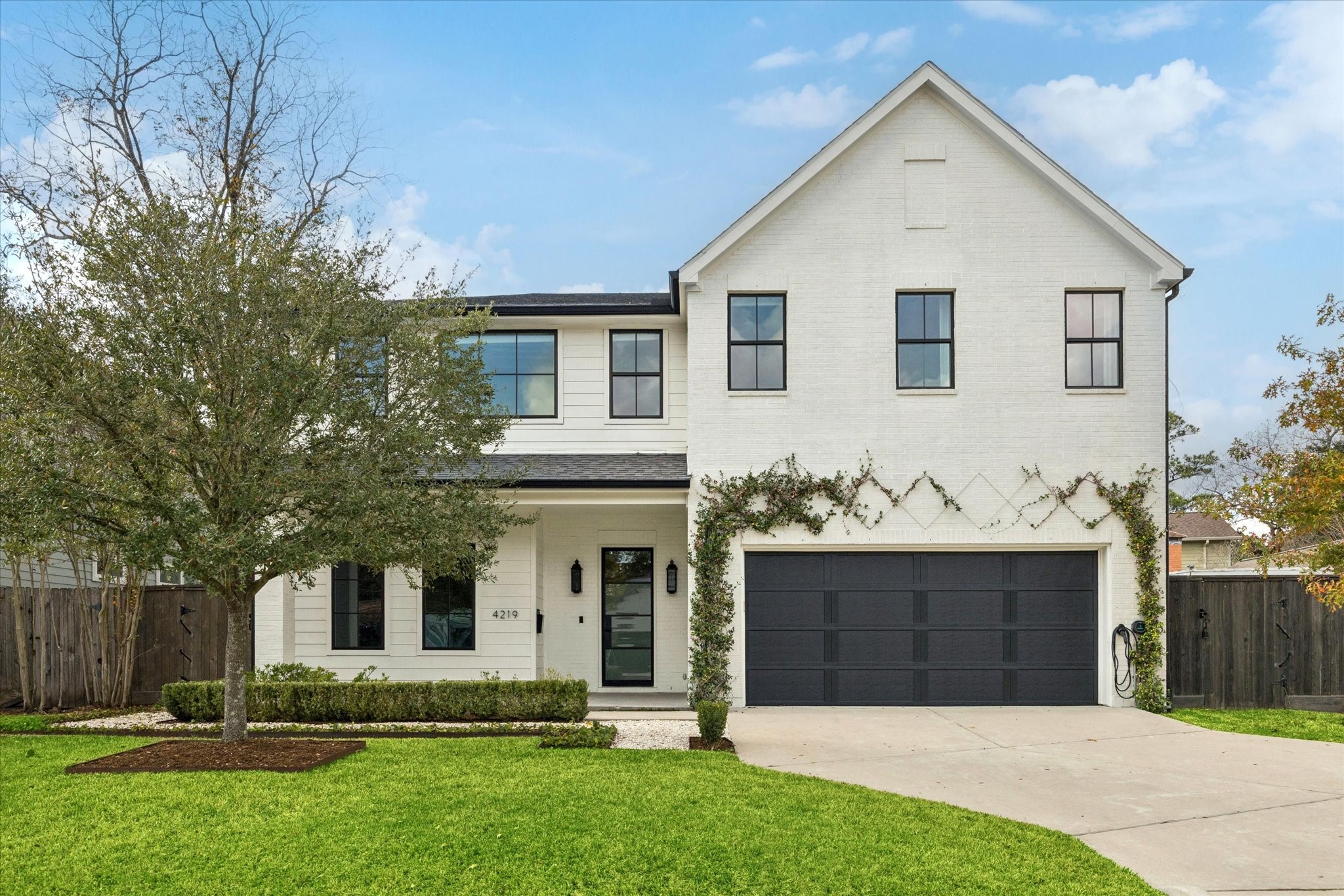 4219 Alba Road Houston, TX 77018 - Photo 2 of 39 a front view of a house with a yard
