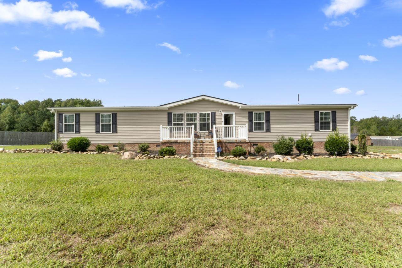 161 Mulchi Road Norlina, NC 27563 - Photo 1 of 38 a front view of a house with a yard