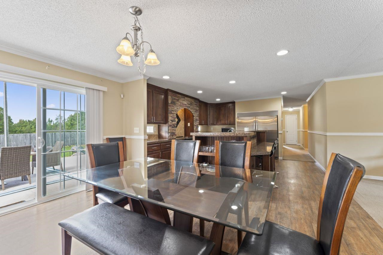 161 Mulchi Road Norlina, NC 27563 - Photo 20 of 38 a view of a dining room with furniture window and wooden floor