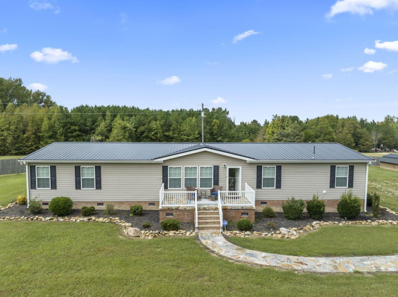161 Mulchi Road Norlina, NC 27563 - Photo 2 of 38 a front view of a house with a yard