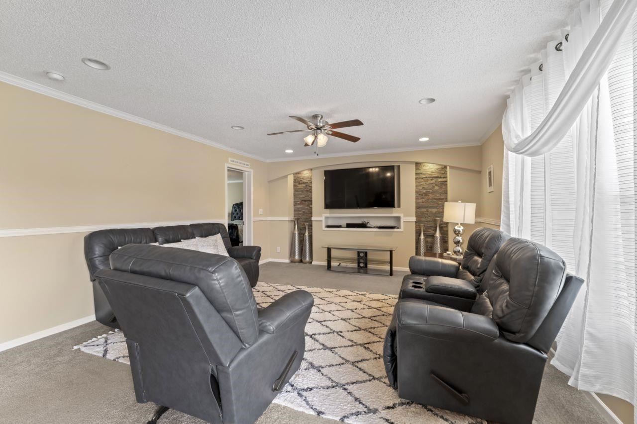 161 Mulchi Road Norlina, NC 27563 - Photo 21 of 38 a living room with furniture and a flat screen tv