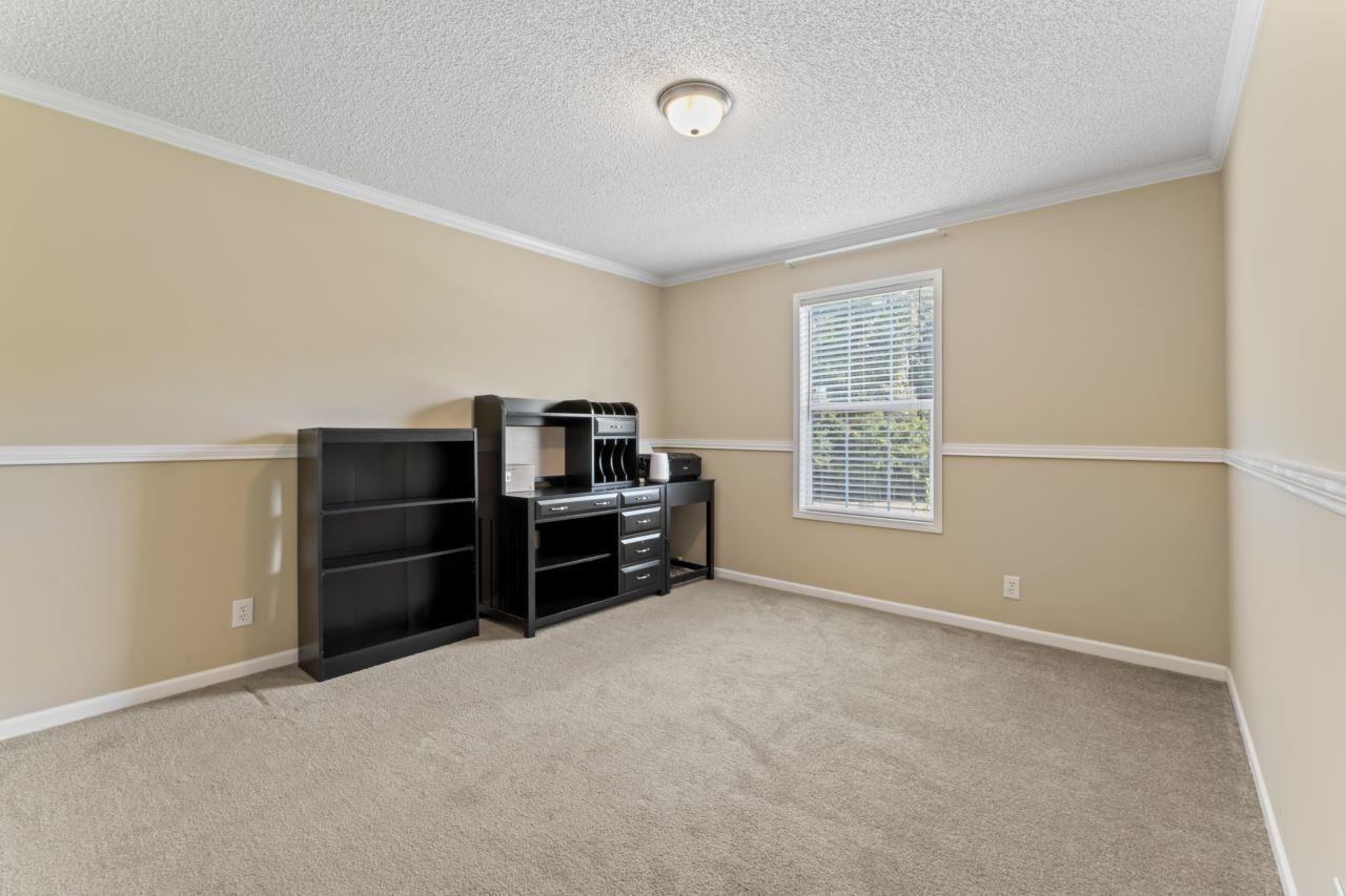 161 Mulchi Road Norlina, NC 27563 - Photo 25 of 38 a room with furniture and window