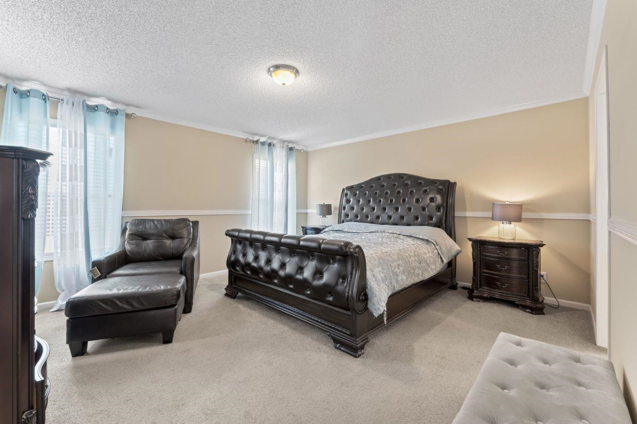 161 Mulchi Road Norlina, NC 27563 - Photo 29 of 38 a bedroom with a bed and a couch