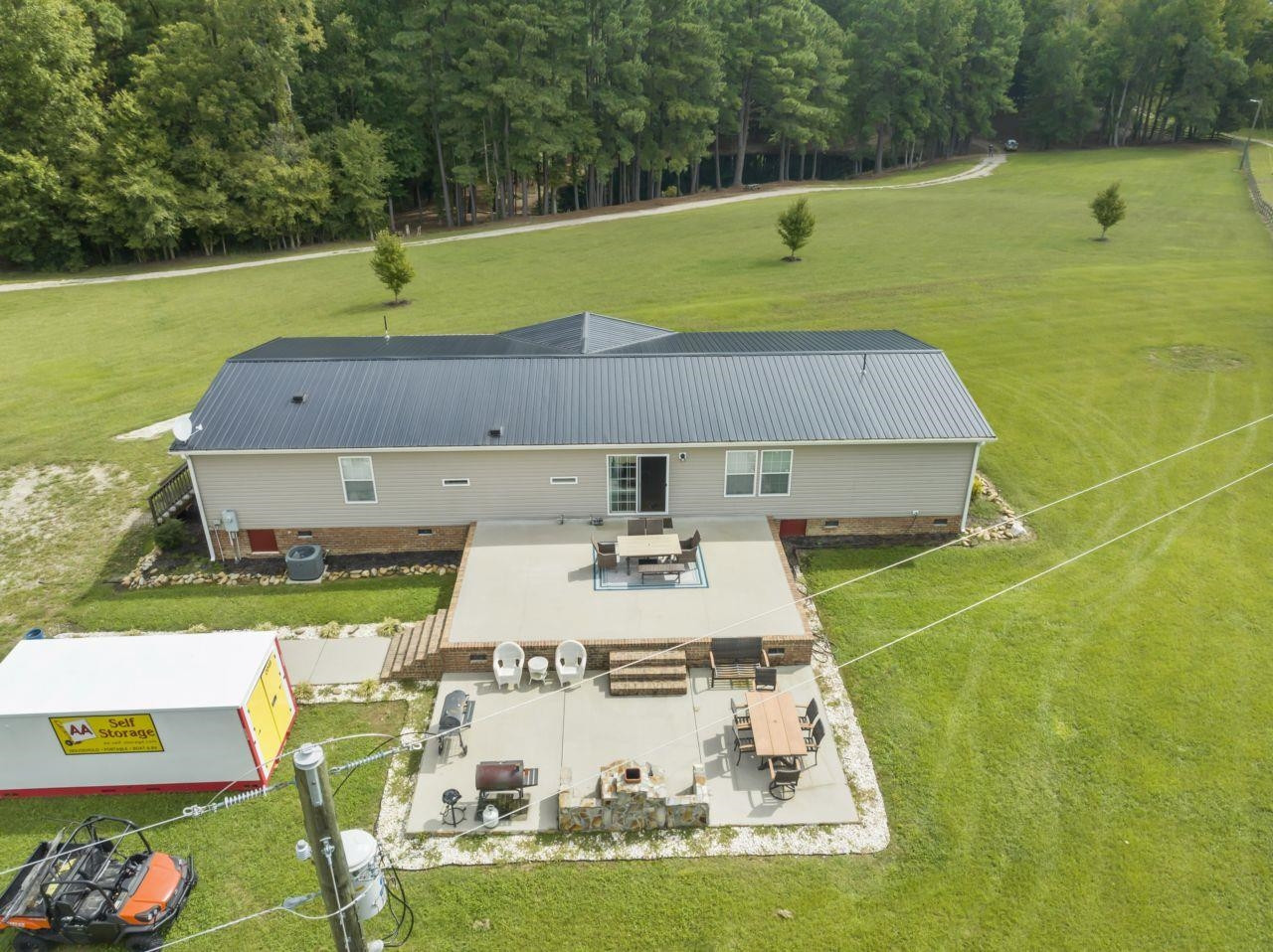 161 Mulchi Road Norlina, NC 27563 - Photo 38 of 38 a view of a swimming pool with a yard