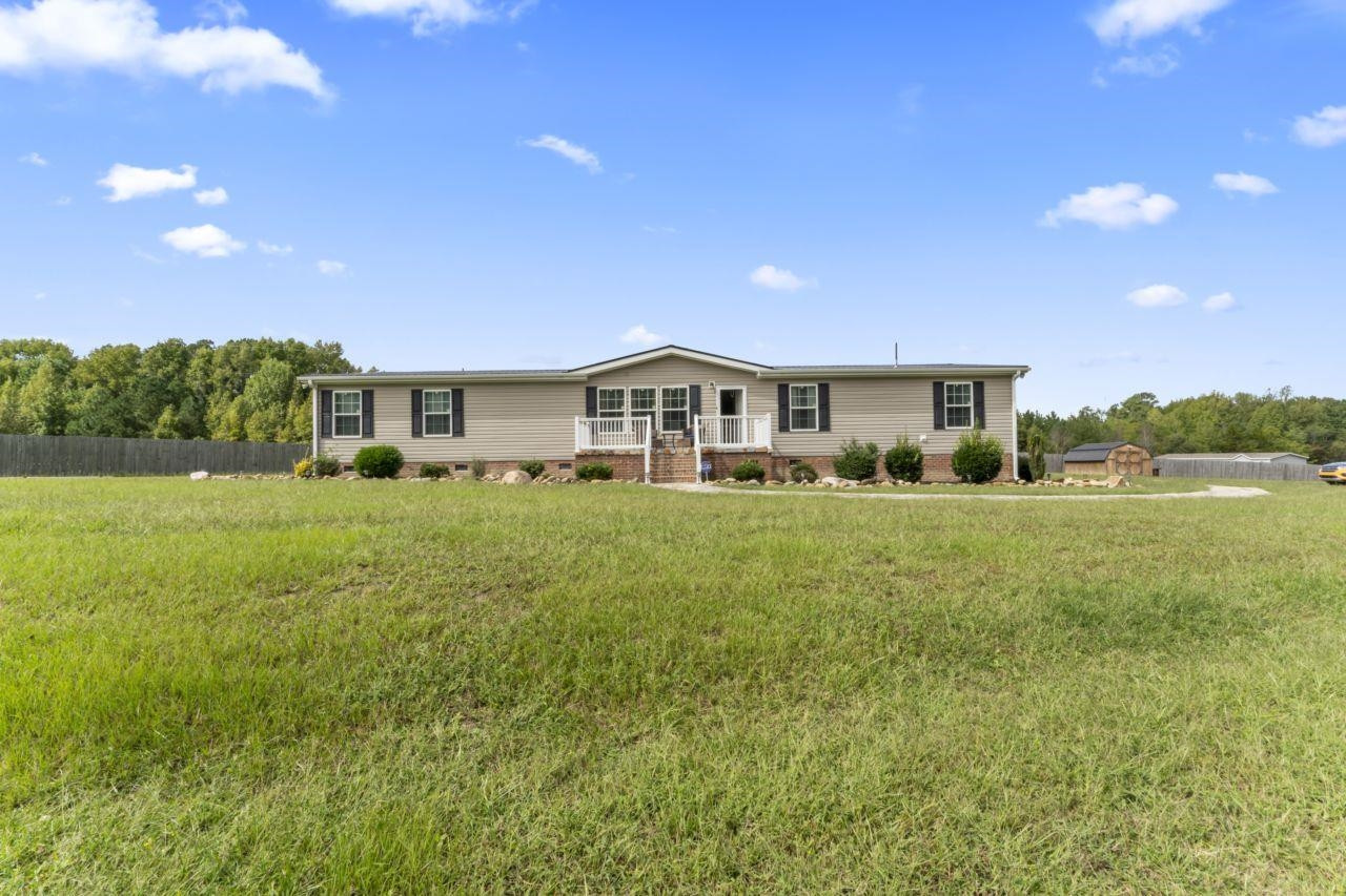 161 Mulchi Road Norlina, NC 27563 - Photo 6 of 38 a front view of a house with a yard