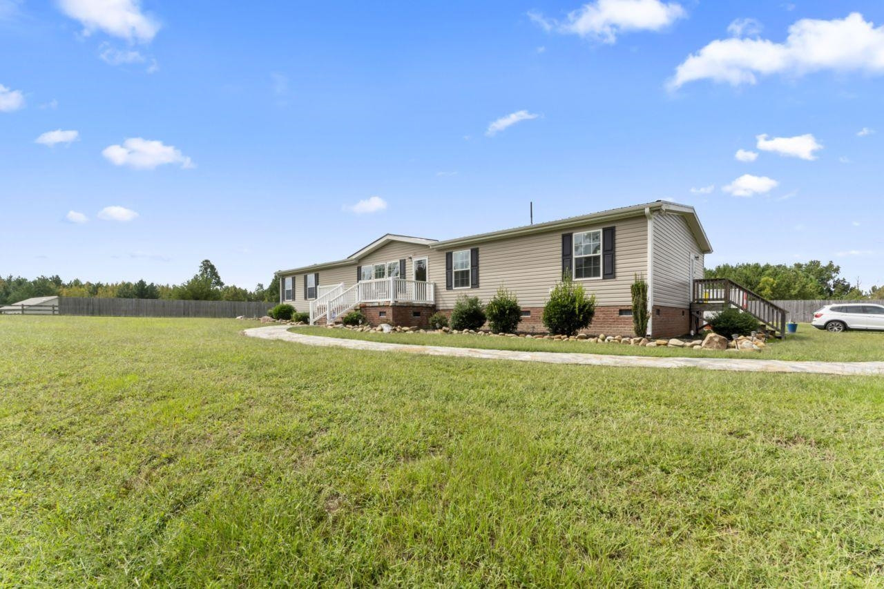 161 Mulchi Road Norlina, NC 27563 - Photo 7 of 38 a front view of a house with garden