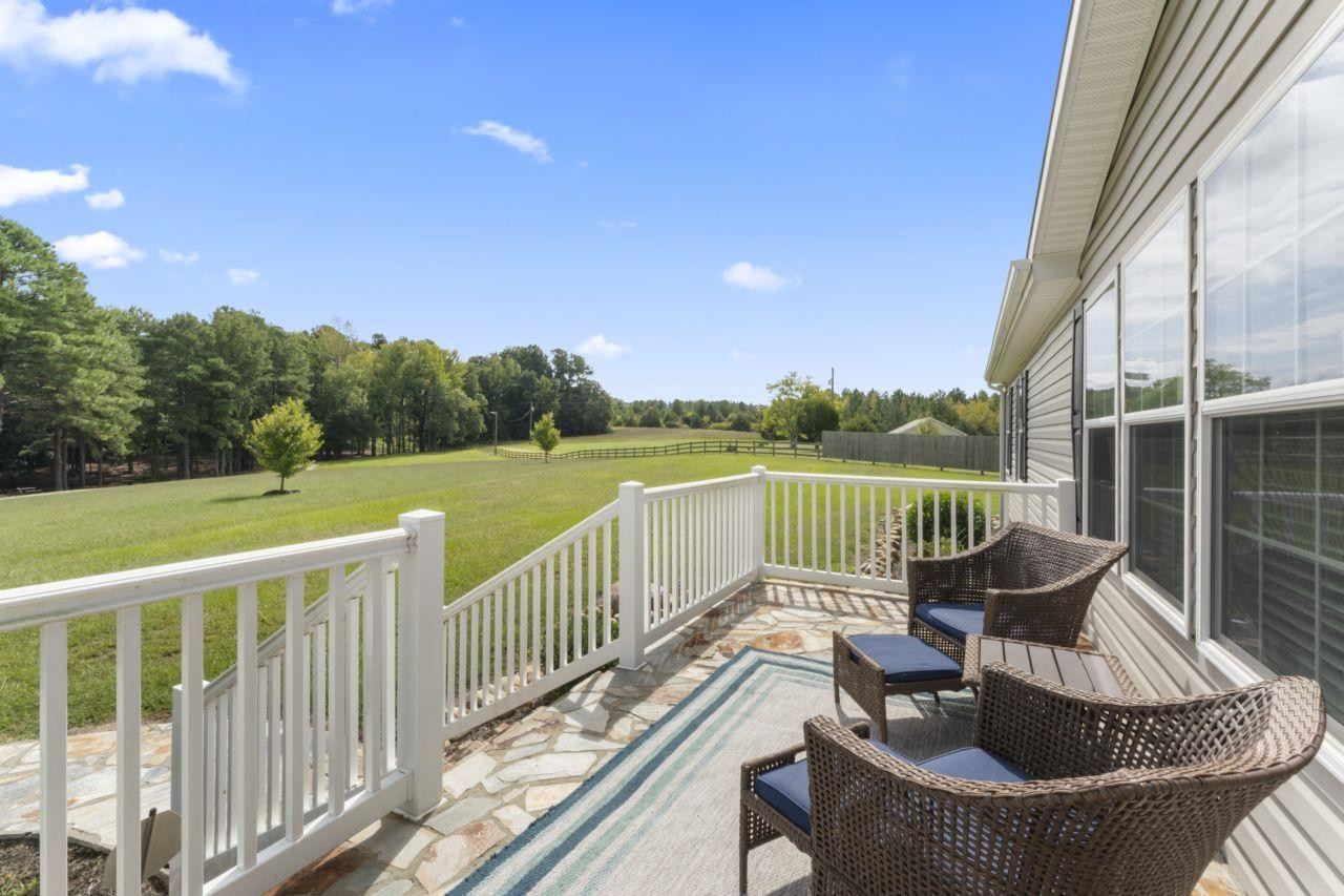 161 Mulchi Road Norlina, NC 27563 - Photo 9 of 38 a view of a chair in a balcony