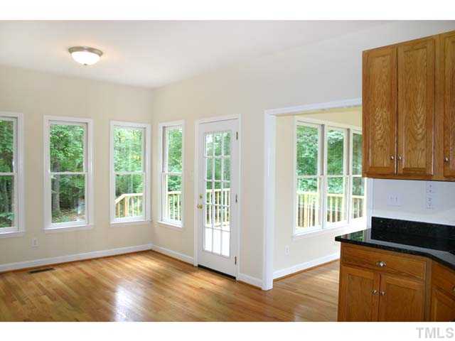 3225 Henderson Field Road Mebane, NC 27302 - Photo 9 of 21 Another view of the Breakfast Area showing full-glass door to Deck.