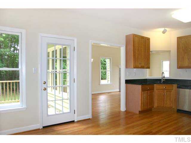 3225 Henderson Field Road Mebane, NC 27302 - Photo 10 of 21 Part of the Kitchen looking through the door to the Dining Room as viewed from the Breakfast Area.