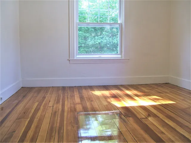 a view of a living room and a window