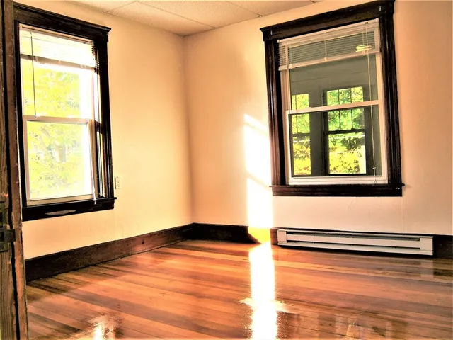 a view of an empty room and window