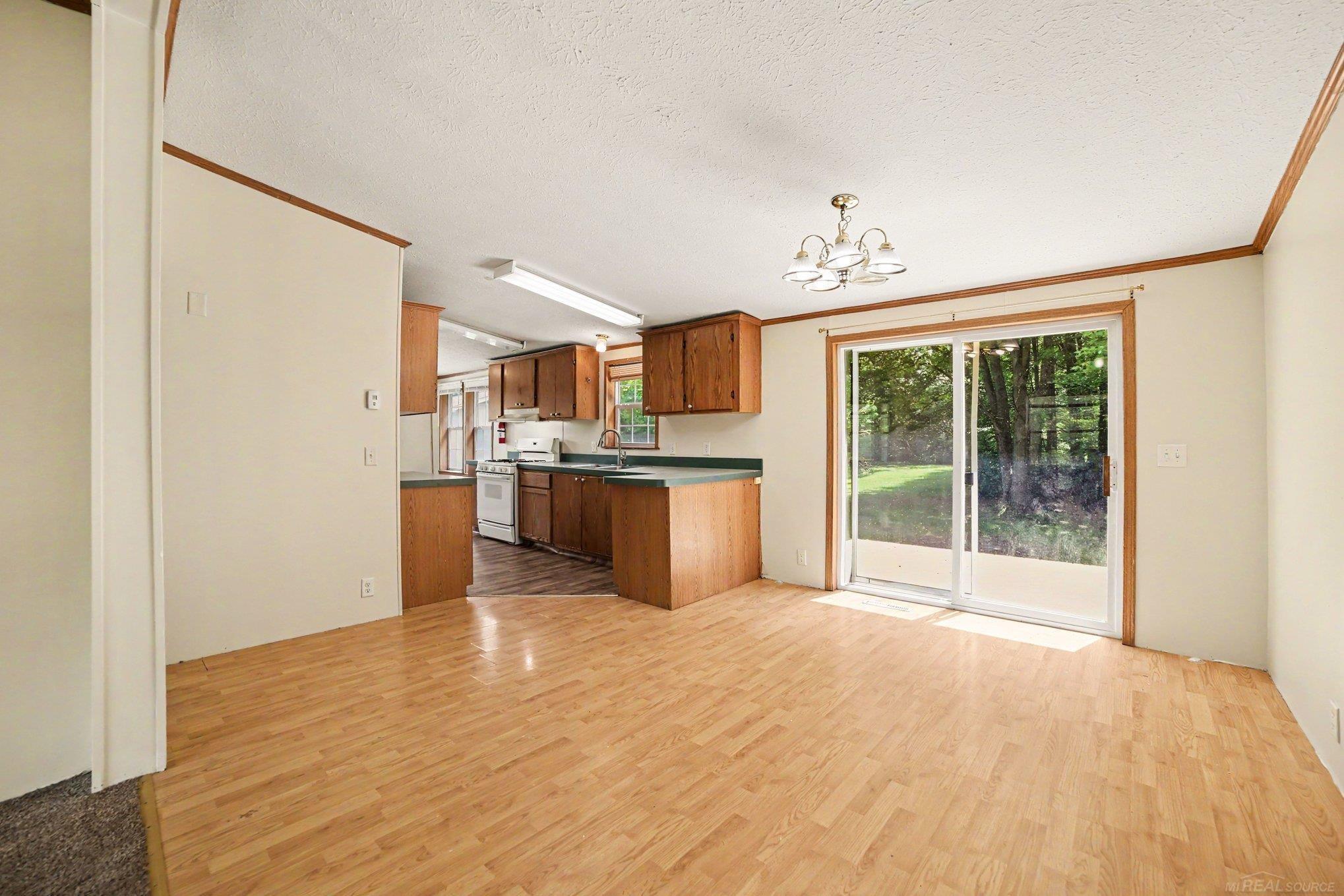 1717 West Townline 16 Road Pinconning, MI 48650 - Photo 7 of 27 50213801-004f2534-276f-489c-b9f7-f985f2c2e71d.JPG