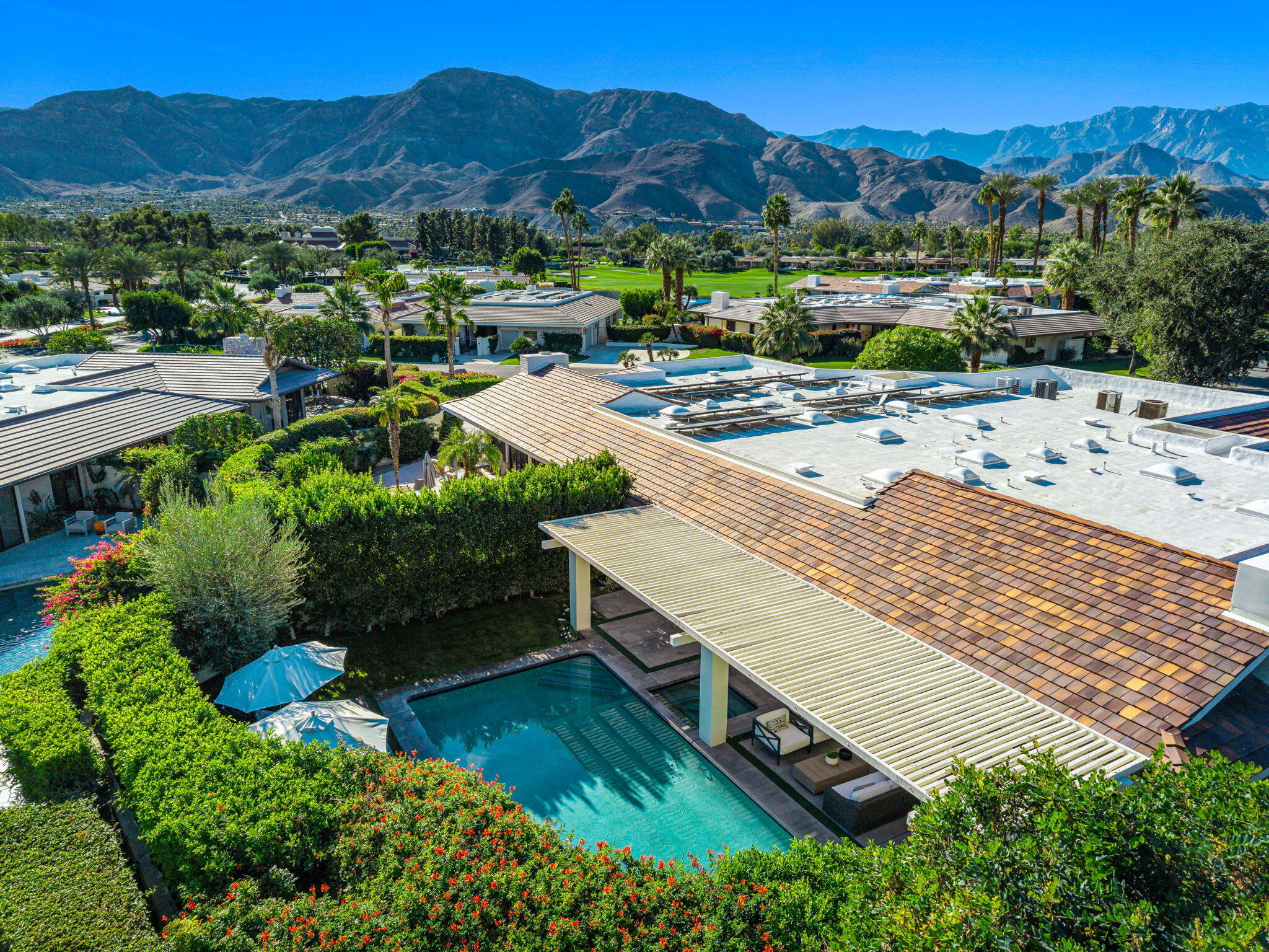 6 Exeter Court Rancho Mirage, CA 92270 - Photo 5 of 54 an aerial view of a house with a garden